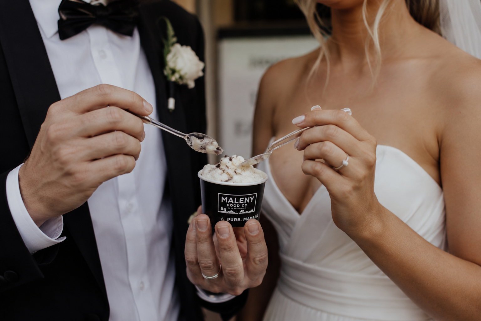 Bride and groom being served from the gelato cart
